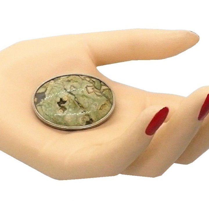 Brooch.
