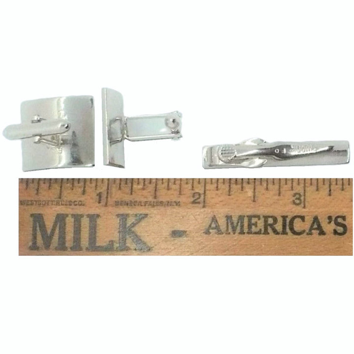 Cufflinks tie clip set.