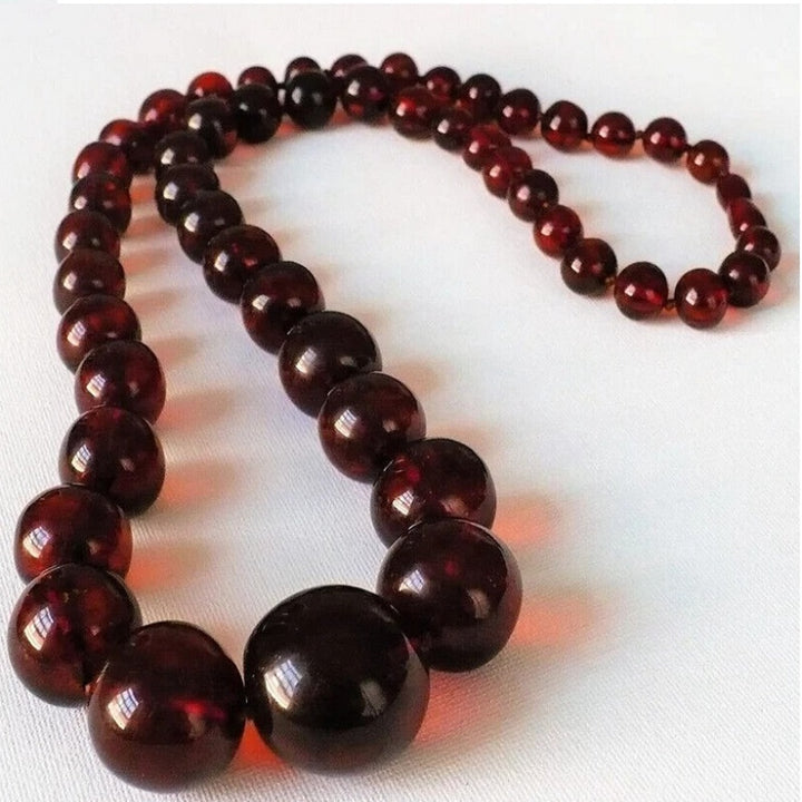1920s Vintage Cherry Amber Necklace Opera Length UV-Verified 33".