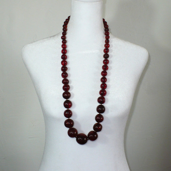 1920s Vintage Cherry Amber Necklace Opera Length UV-Verified 33".