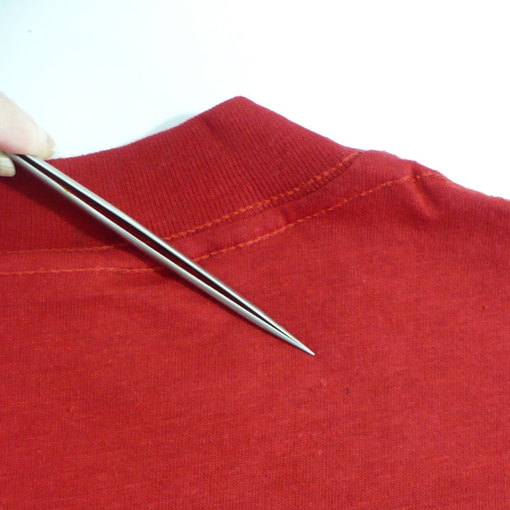 Aerosmith Done With Mirrors Reunion Tour Shirt detail of small hole at back right shoulder area.