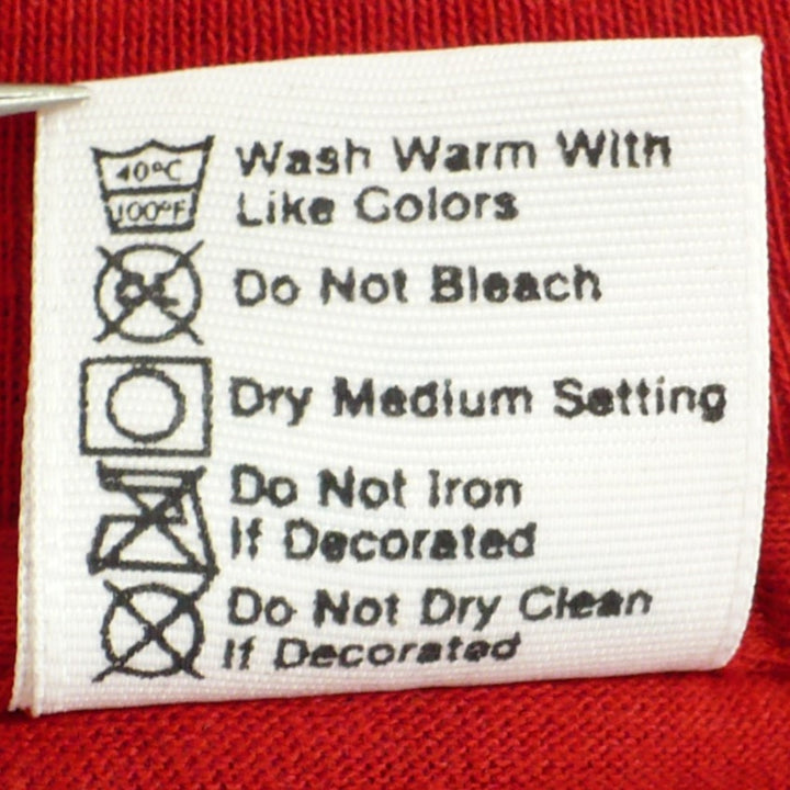Aerosmith Done With Mirrors Reunion Tour Shirt care instructions on tag.