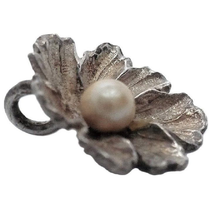 Silver Flower and Pearl Pendant.