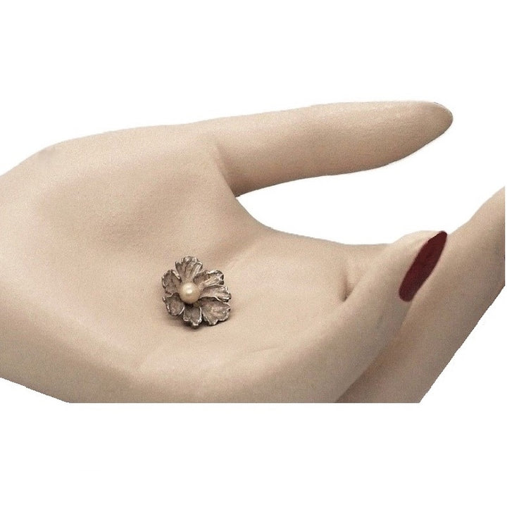 Silver Flower and Pearl Pendant.