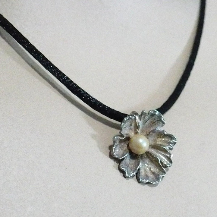 Silver Flower and Pearl Pendant.