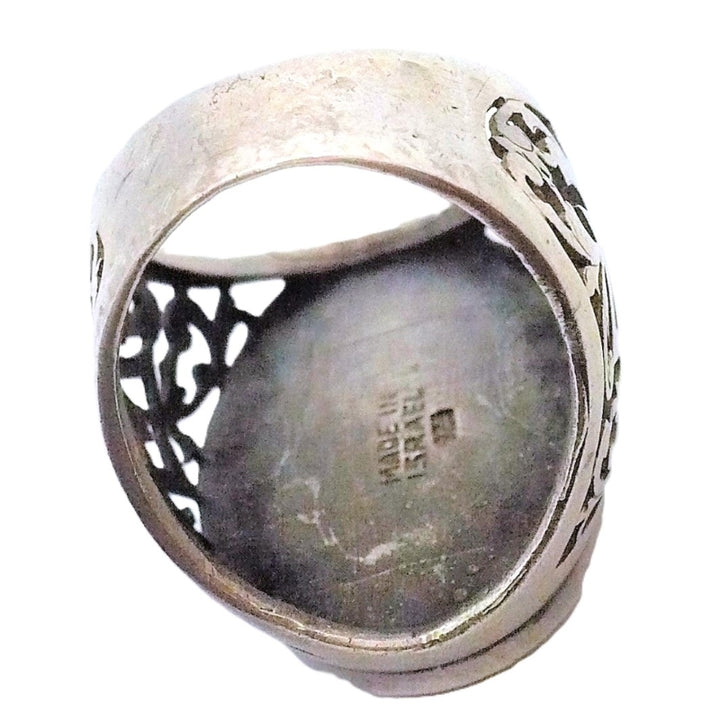 Ring shows Made In Israel and 925 sterling silver hallmarks.