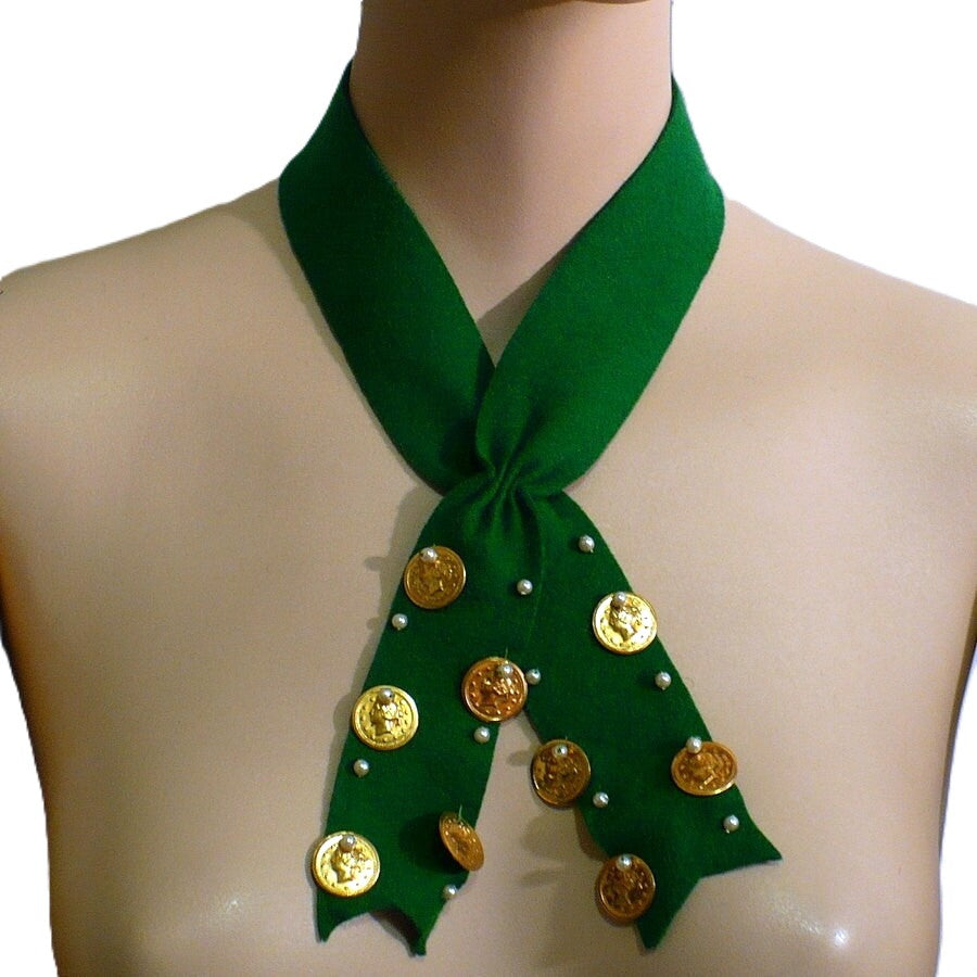 Pearl and coin cross tie.