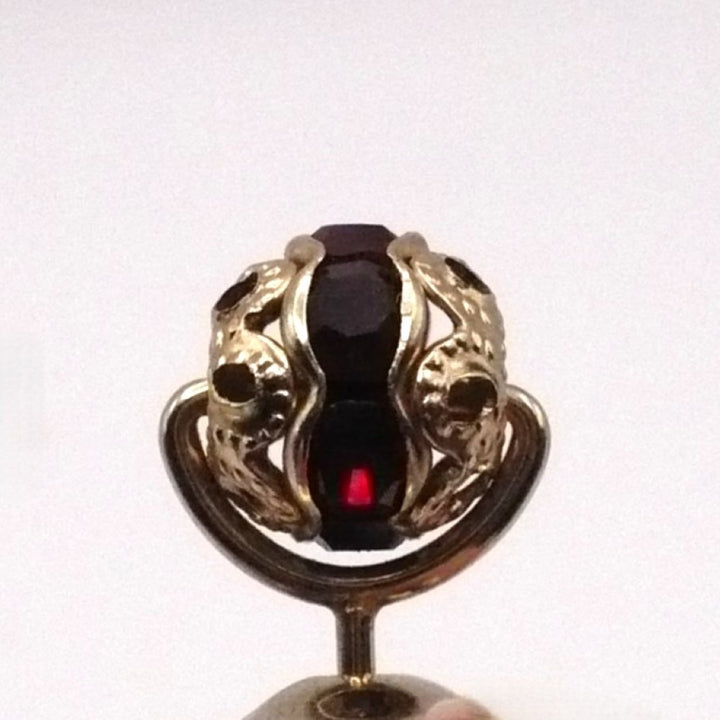 Vintage tie tack with chain and bar.