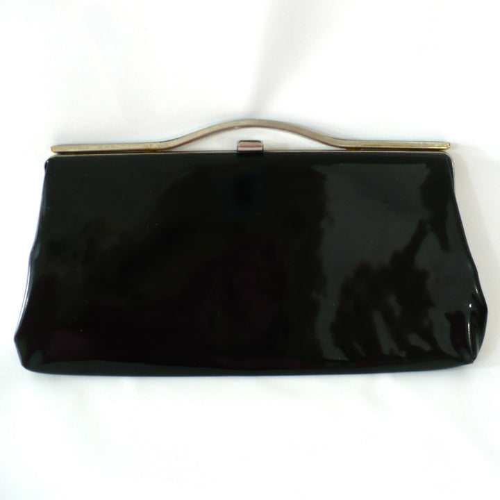 1964 Vintage Black Patent-look Cutout Handle Long Slender Handbag.