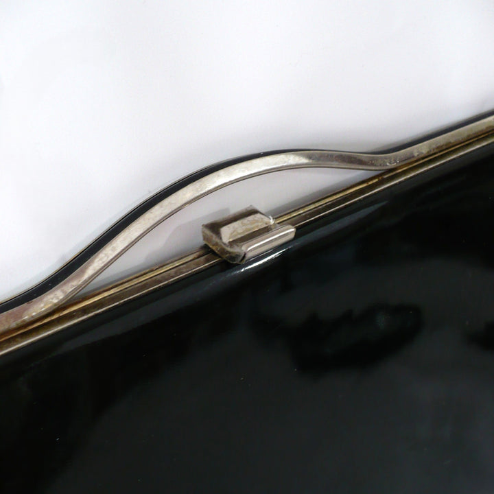 1964 Vintage Black Patent-look Cutout Handle Long Slender Handbag.