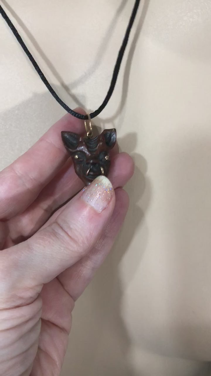 Video of 1960 Vintage Samurai Oni Hannya Mask Warthog Pendant 24k Gold.