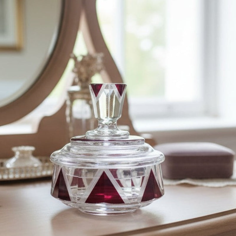 Vintage Karl Palda Art Deco cut glass lidded powder jar, red and clear geometric vanity decor.