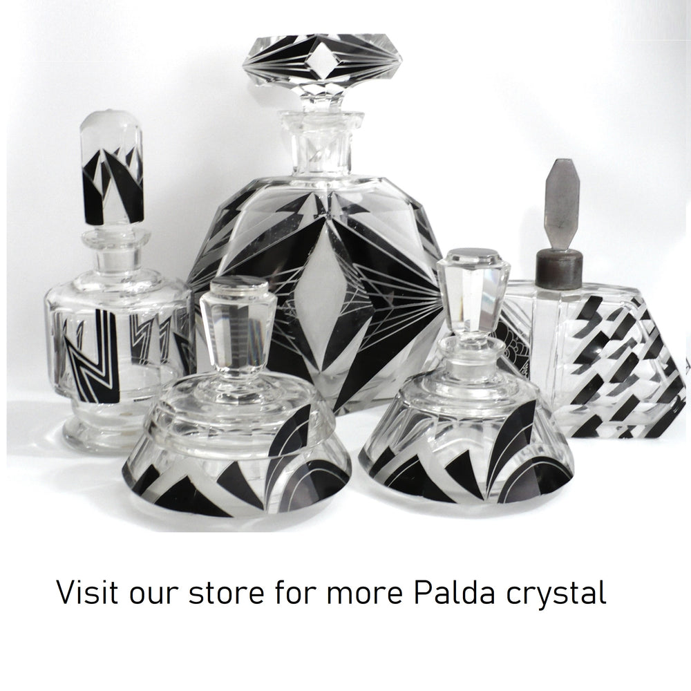 Collection of black enamel Palda vanity pieces.