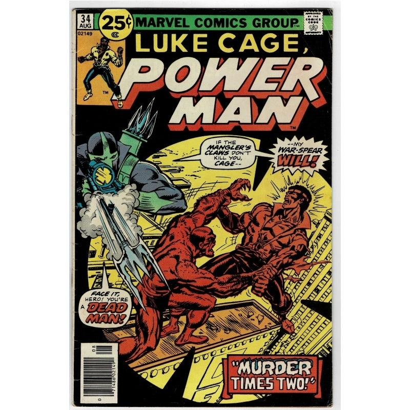 A vintage comic book, Marvel Comics Group's Luke Cage, Power Man #34 from July, featuring a cover illustration of Luke Cage in red fighting a green and black villain with a silver war-spear. The comic is photographed flat against a white background.