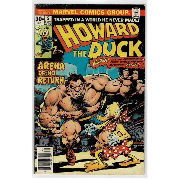 Front cover of Marvel Comics Group's Howard the Duck #5 comic book, featuring a muscular duck-like fighter overpowering Donald Duck in a ring, with large yellow title text and issue details.