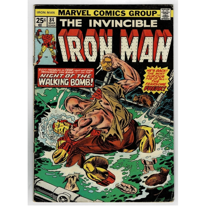 Vintage Marvel Comics Group 'The Invincible Iron Man' comic book cover, issue 84 from March 1963, featuring Iron Man fighting a creature in green water with bold comic-style title text.