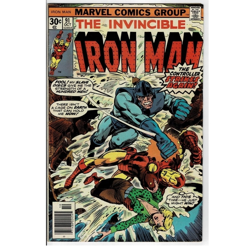 Vintage Marvel Comics Group 'The Invincible Iron Man' comic book, issue #31, featuring a cover illustration of Iron Man fighting other characters. The comic is photographed flat against a white background.