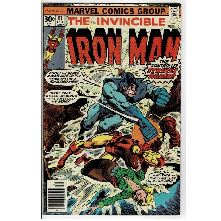 Vintage Marvel Comics Group 'The Invincible Iron Man' comic book, issue #31, featuring a cover illustration of Iron Man fighting other characters. The comic is photographed flat against a white background.