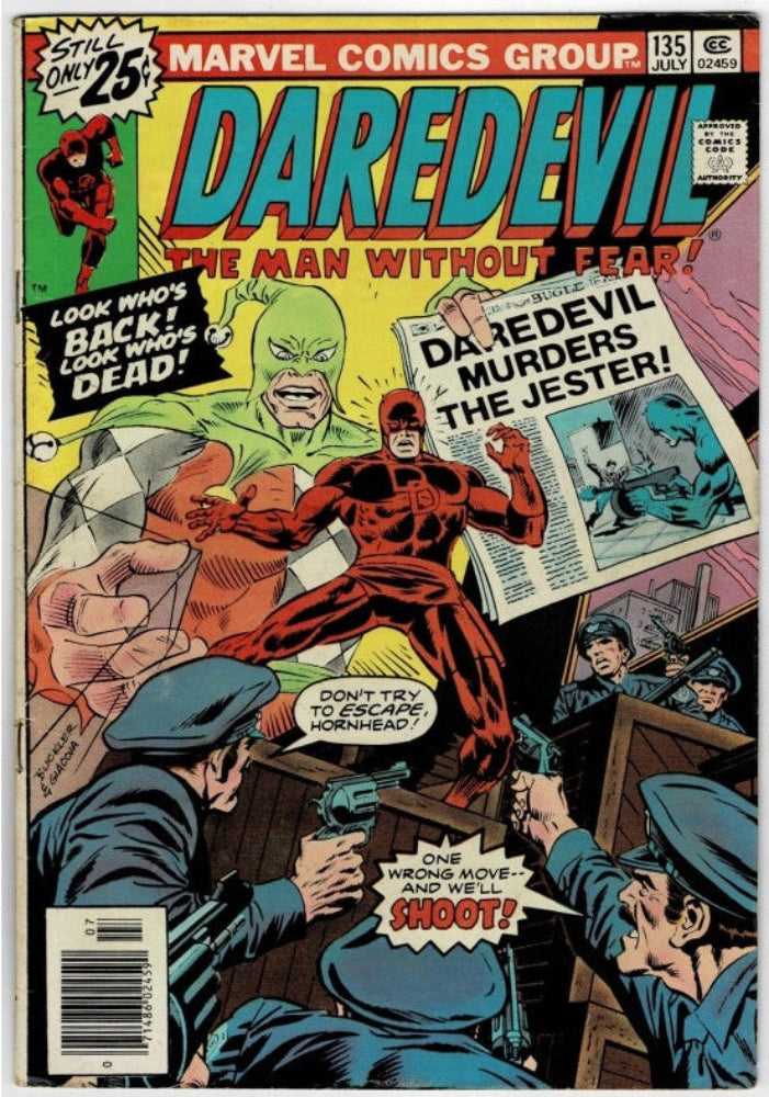 Marvel Comics Group Daredevil issue 135 comic book cover, featuring the red-masked Daredevil in the center with police officers below and a green monster face above, on a mostly yellow and red cover.