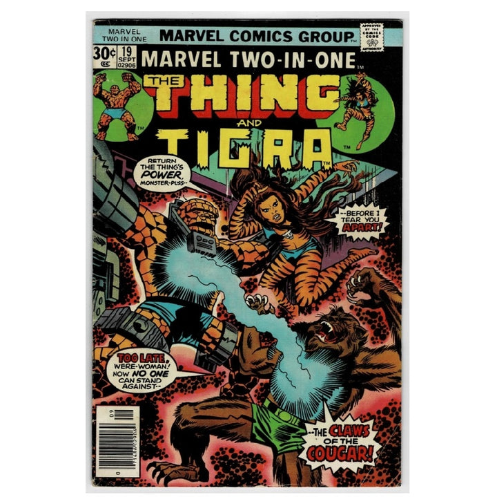 Marvel Two-In-One #19 comic book cover featuring The Thing and Tigra in an action scene with a cougar and a robotic creature. The cover has bold yellow title text and classic comic-style artwork.