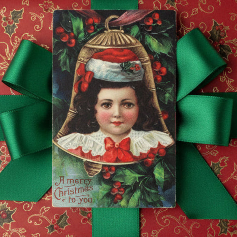 1907 A Belle Bell of Christmas Nostalgia Vintage Postcard as a gift topper.