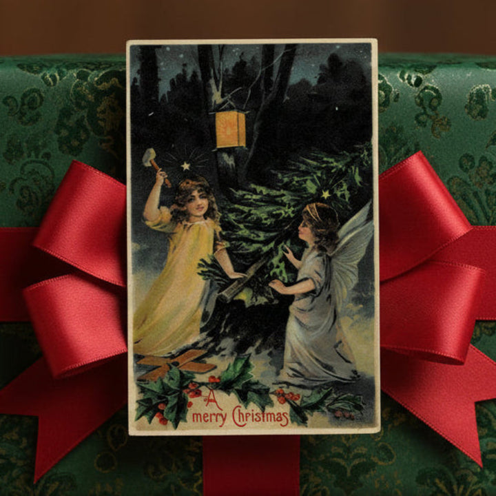 1910 Yuletide Night Scene Vintage Christmas Postcard gift topper,, surrounded by red ribbons on green fabric.