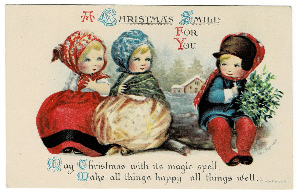 1909 A Christmas Smile by Clapsaddle Artist Signed Vintage Postcard.