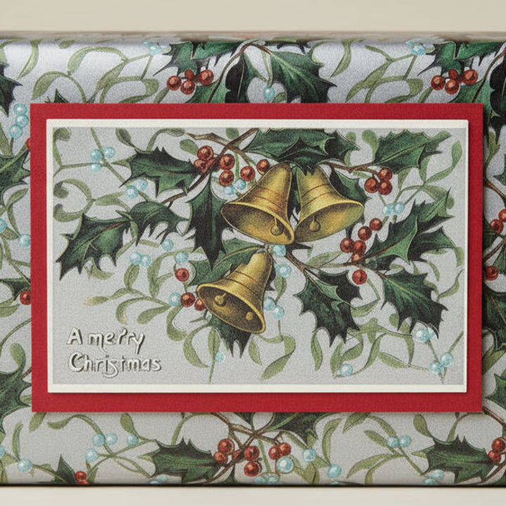   1912 Ring Christmas Bells, Merrily Ring Vintage Christmas postcard on gift as gift topper.