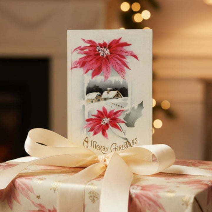 1911 Pink Poinsettias and Snowy Night Scene Vintage Christmas Postcard, shown as gift topper.
