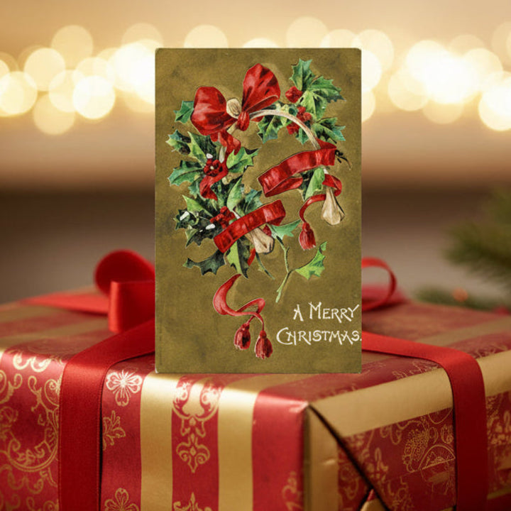 1909 Gilded Wishbone Christmas Wish Vintage Postcard, shown as gift topper.