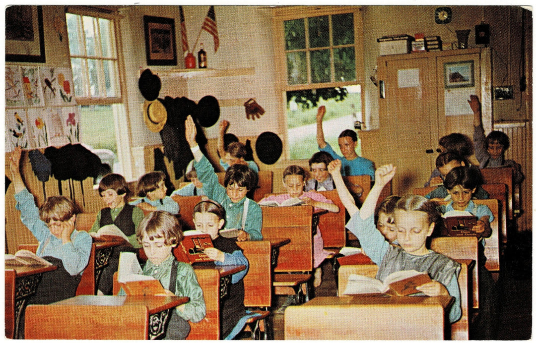 1950s Amish Schoolhouse Lancaster Pennsylvania Vintage Postcard. Children at their desks, a charming scene.