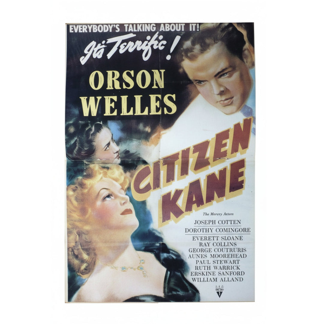Vintage magazine centerfold movie poster for the film 'Citizen Kane' starring Orson Welles, featuring stylized portraits of characters and bold title text on a mostly black and cream background.