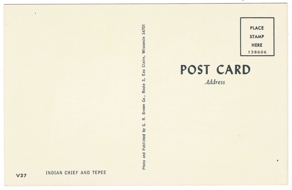 1960s Native American Chief in Eau Claire Wisconsin Postcard, back view.