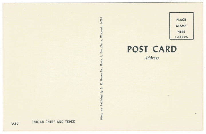 1960s Native American Chief in Eau Claire Wisconsin Postcard, back view.