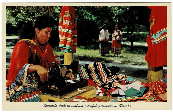 Seminole Indian making colorful garments in Florida, vintage postcard.