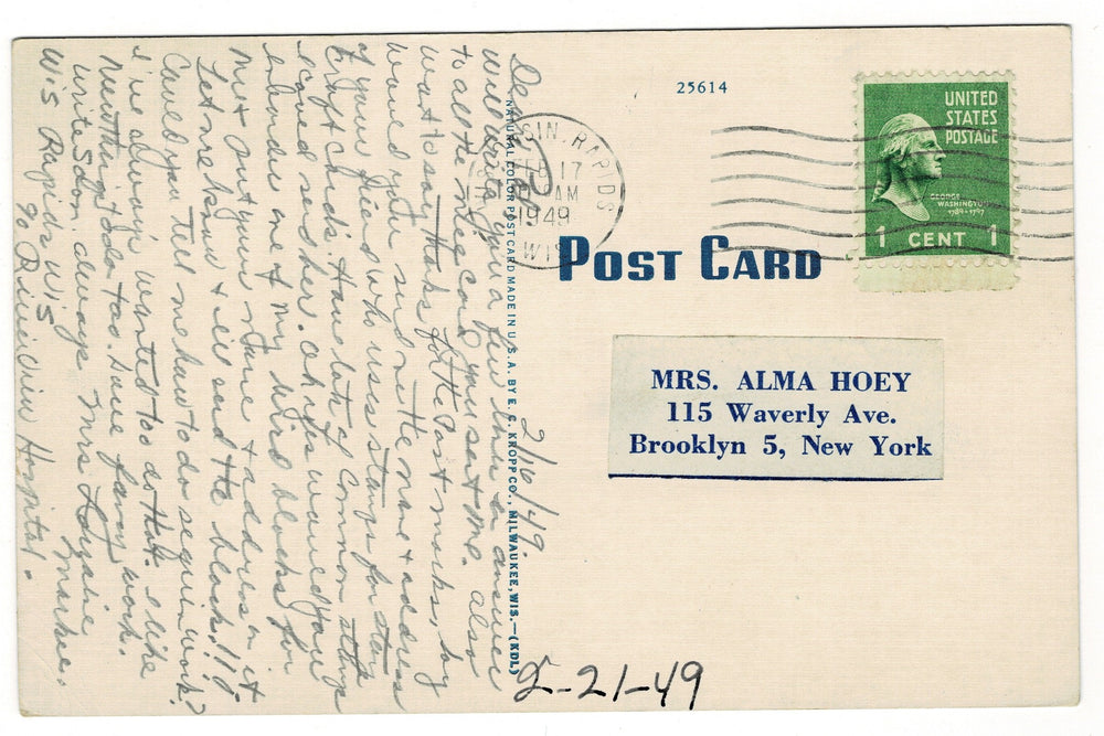Vintage postcard with handwritten text, postage stamp, and address details.
