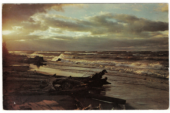 1951 Stormy Beach at Sunset, Wisconsin Vacationland Vintage Postcard.