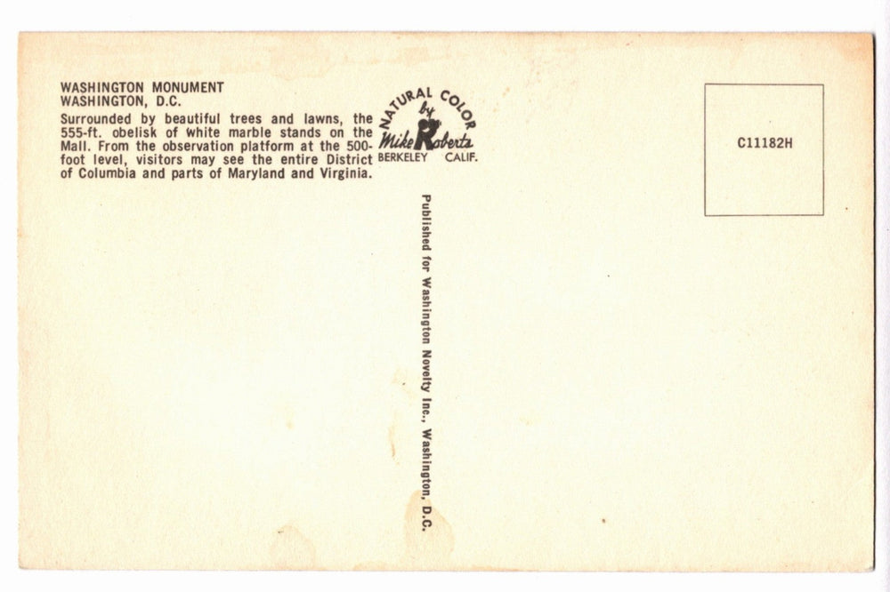 Back of a postcard with text about the Washington Monument and branding details.