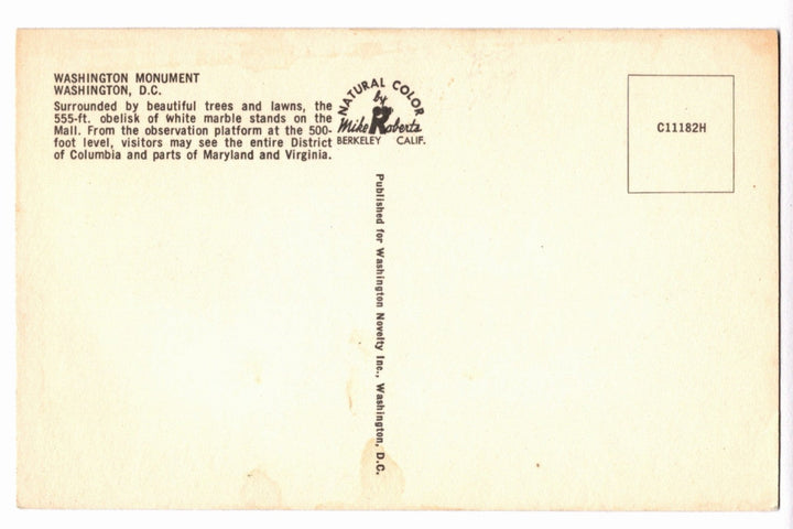 Back of a postcard with text about the Washington Monument and branding details.