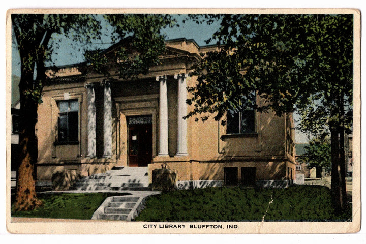 Vintage postcard of a city library building with columns and steps, Bluffton, Indiana.