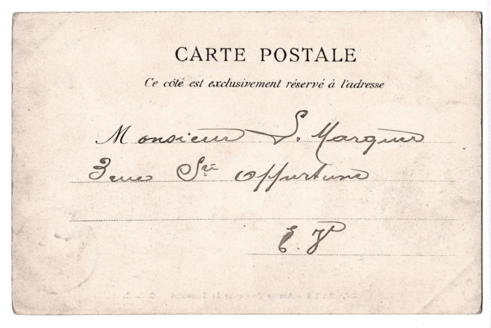 Vintage postcard with handwritten text on a beige background.