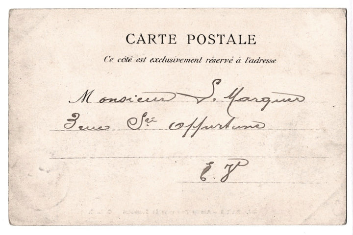 Vintage postcard with handwritten text on a beige background.