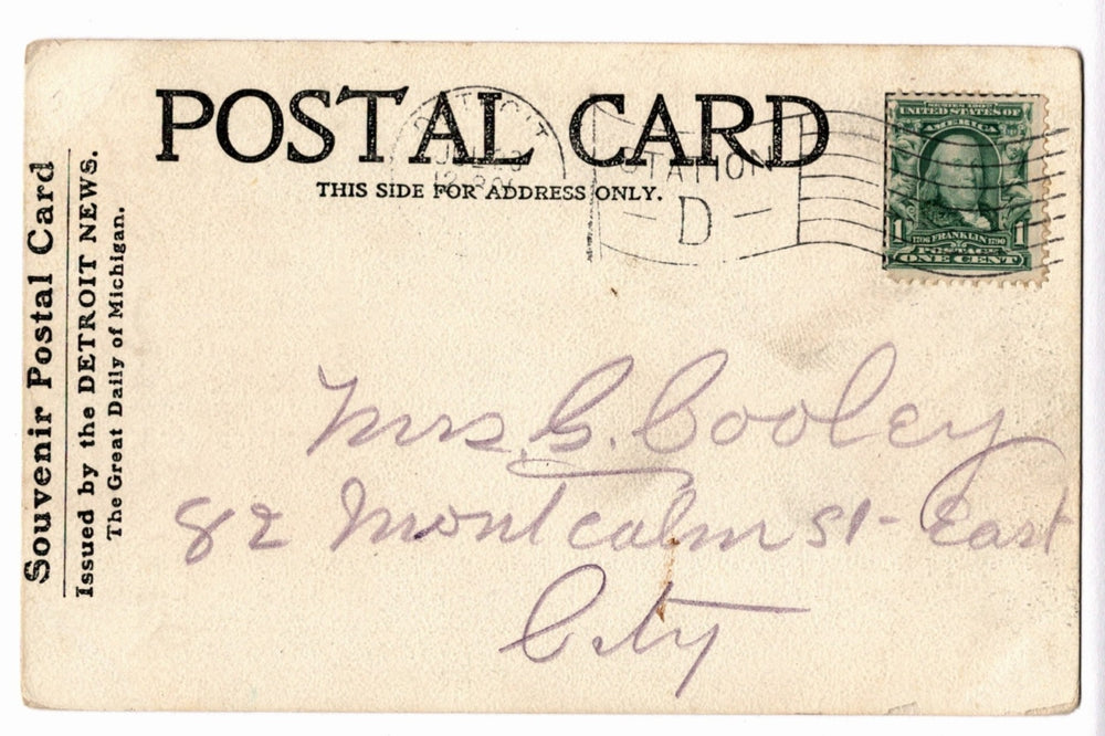 Vintage postal card with handwritten address and stamp, issued by The Detroit News.