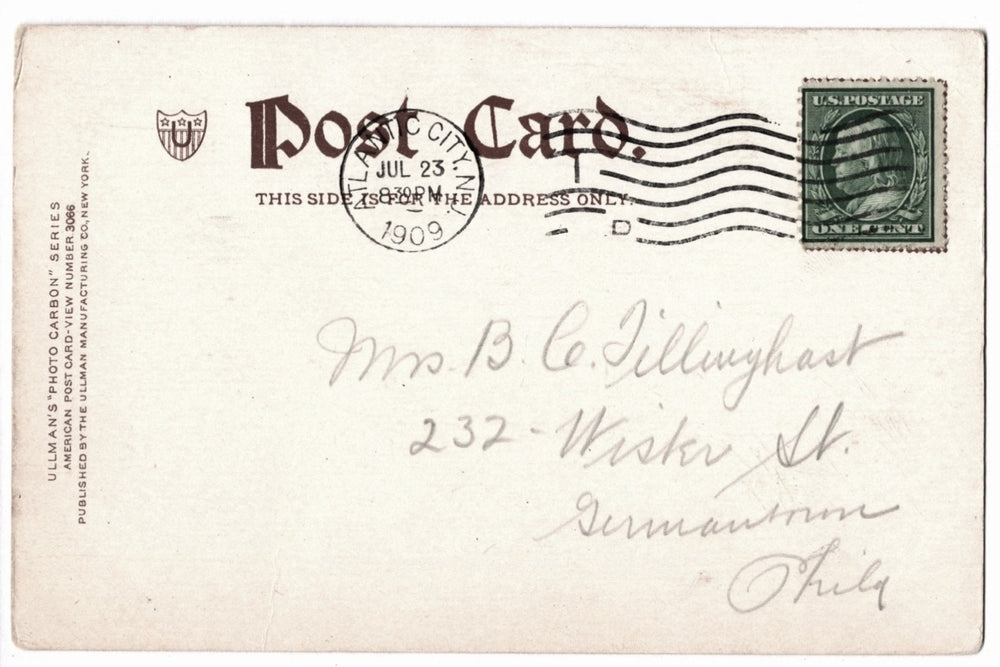 Vintage postcard with postage stamp and address.