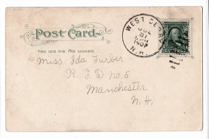 Vintage postcard with stamp and cursive writing.