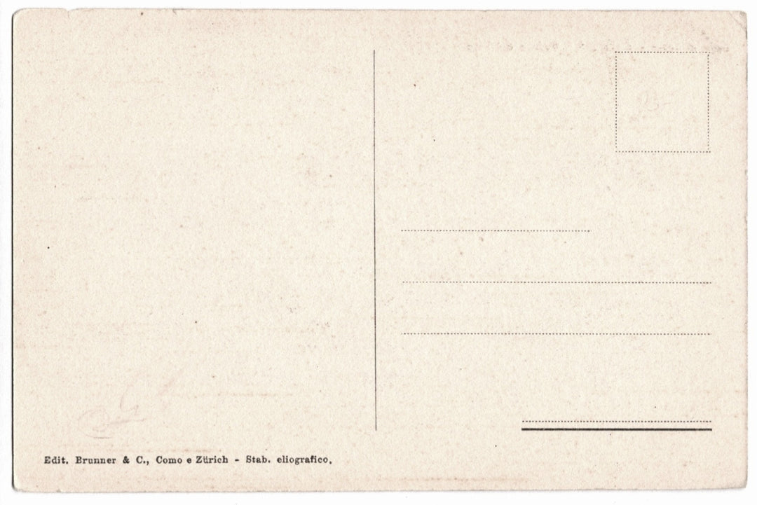 Back of a vintage postcard with printed text and lines for writing.