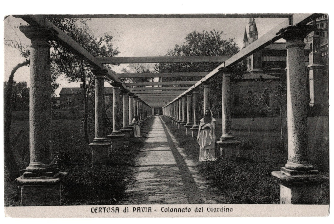 Vintage photograph of a colonnaded garden pathway with monks standing, labeled 'Certosa di Pavia'. 1910s Garden Colonnade Certosa di Pavia Lombardy Italy Vintage Postcard.