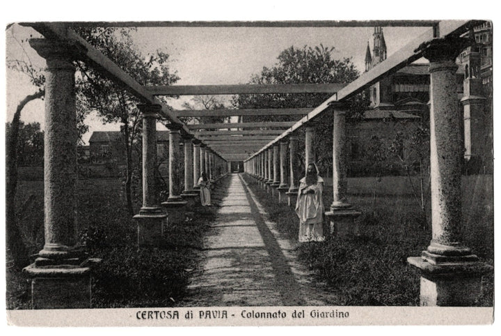 Vintage photograph of a colonnaded garden pathway with monks standing, labeled 'Certosa di Pavia'. 1910s Garden Colonnade Certosa di Pavia Lombardy Italy Vintage Postcard.