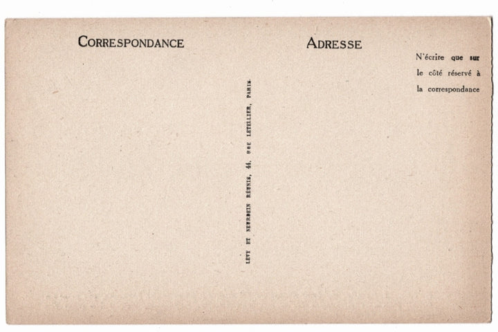 Back of a vintage postcard with text in French.