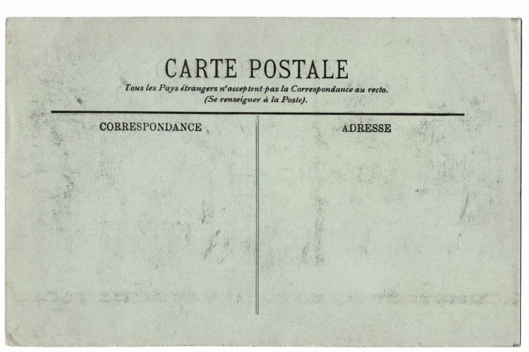 Vintage- green buff back of postcard with text and a line for correspondence and address.
